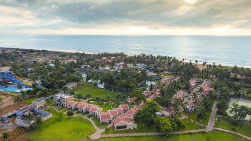 Panoramic view of a coastal area with residential buildings